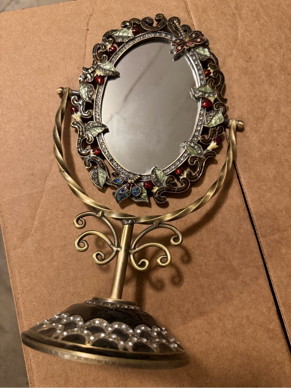 Vintage decorative mirror with floral design